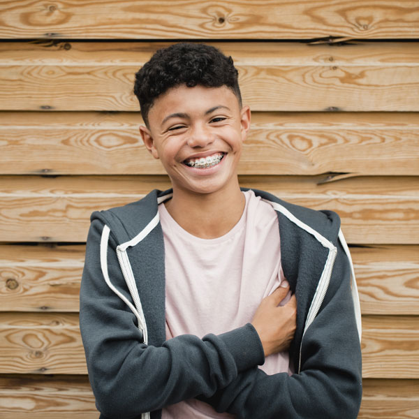 young boy with braces
